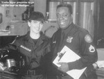 Yvette Nipar and Blu Mankuma in "RoboCop"